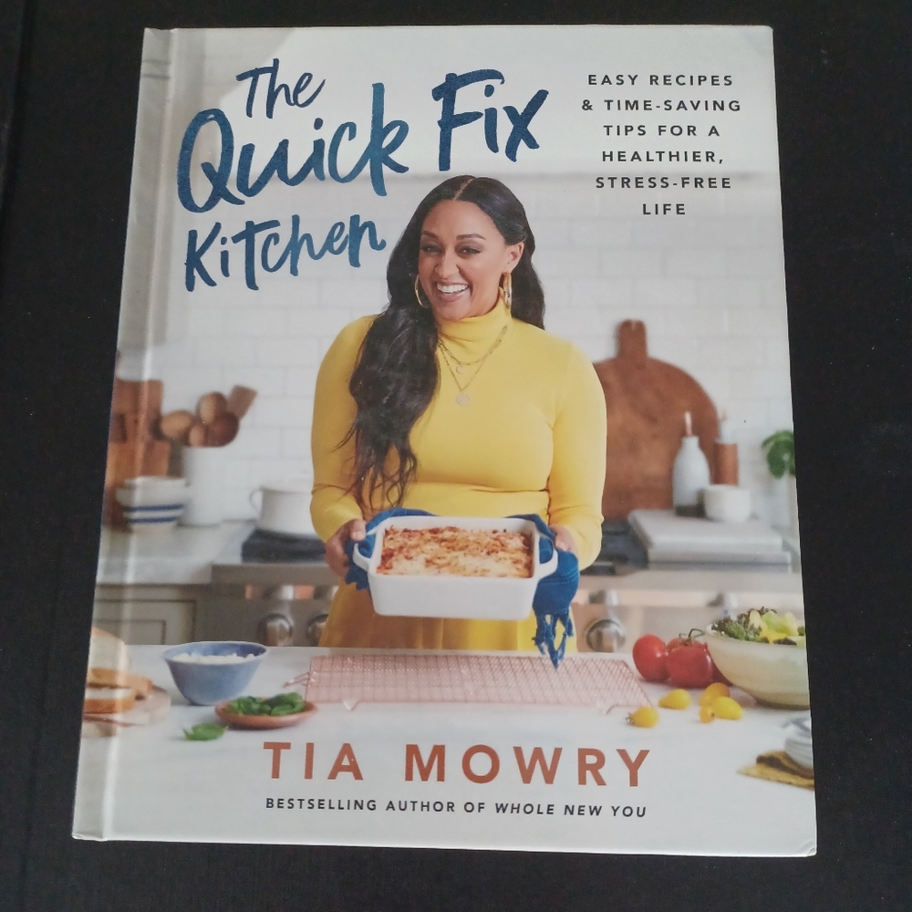 The Quick Fix Kitchen by Tia Mowry hardcover cookbook.  Easy Recipes